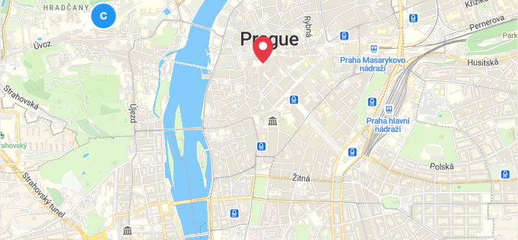 Prague map with a custom red pin and a circular badge icon as MapLibre GL JS markers.