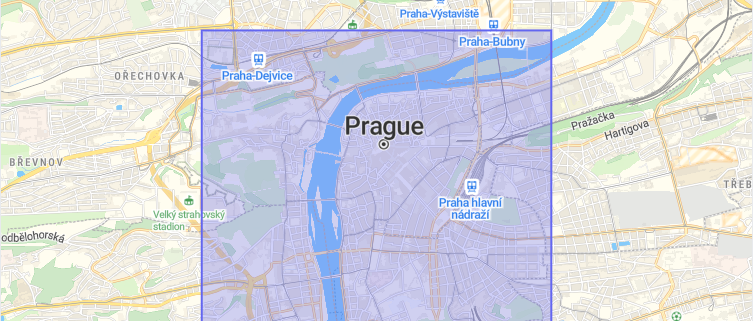 Prague map with a filled purple polygon area drawn using a GeoJSON fill layer.